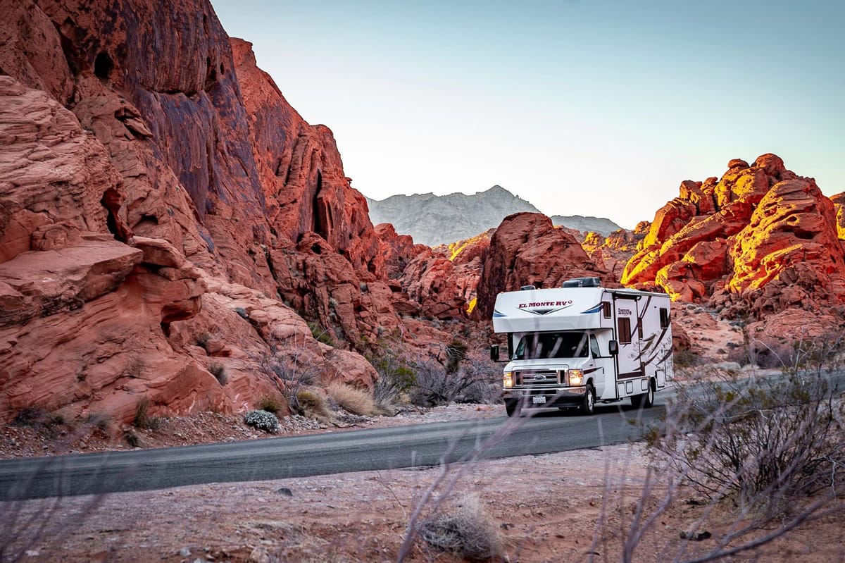 El Monte RV motorhome driving through red rock canyon country in the USA